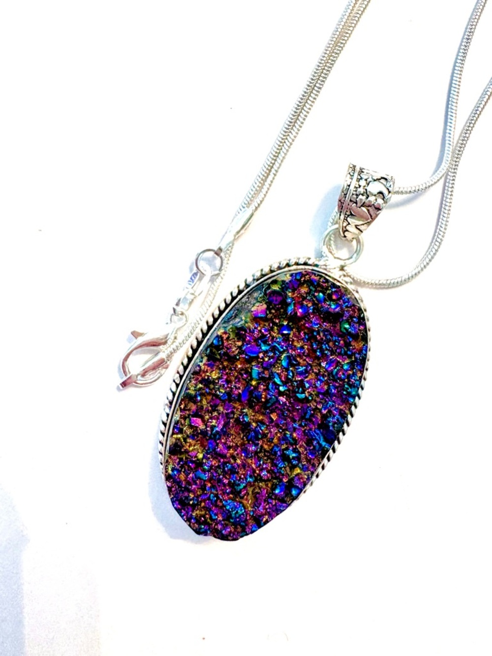 Beautiful, 2 inch,  multicolor, Titanium Druzy on a silver chain.